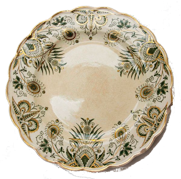 an old-fashioned plate with curly motifs on, suggesting both flowers and owls