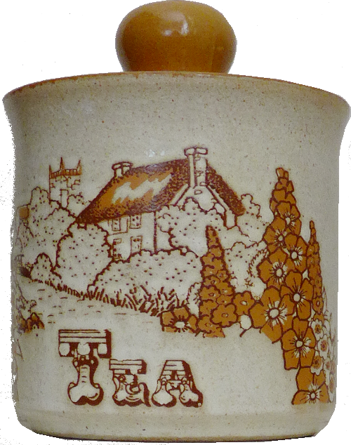 a small ceramic pot with the word 'Tea' on it and a picture of a cottage