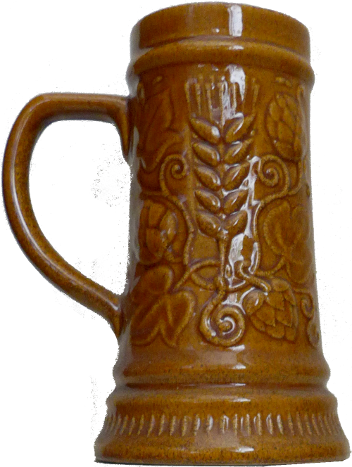 a tall ceramic tankard, amber colour with an engraving of wheat